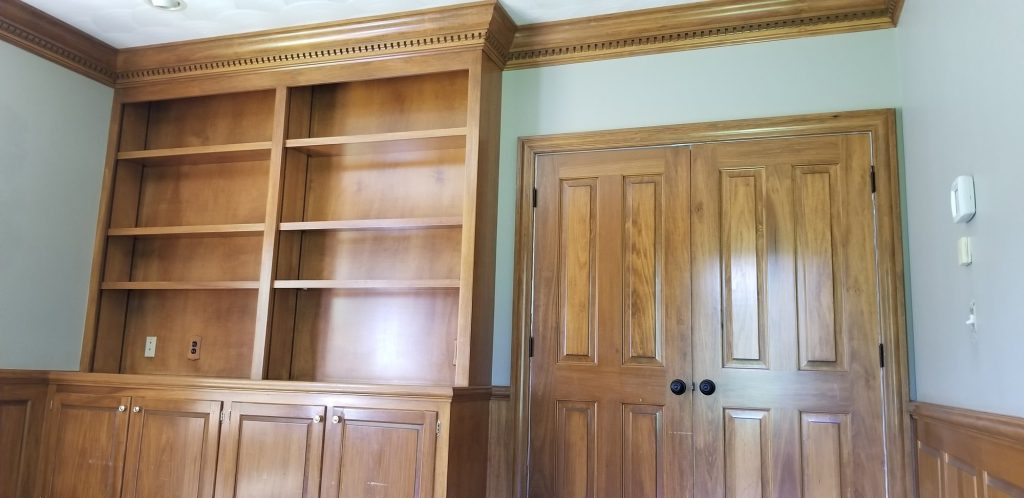 Built in bookshelf cabinet stain before — Segor Painting, Columbus OH