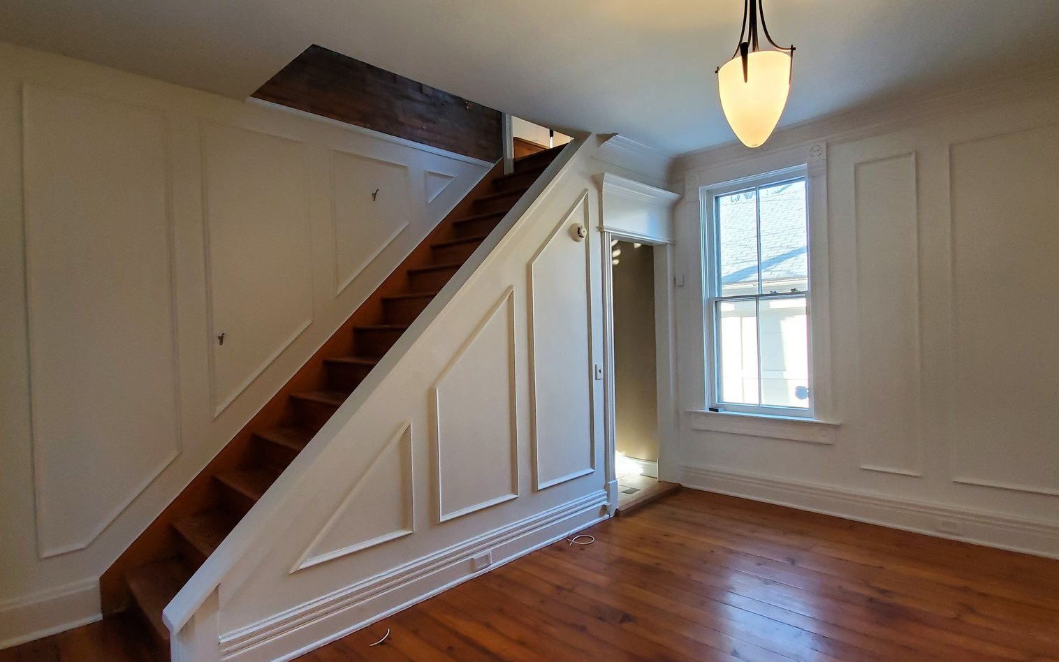 Wainscoting staircase painted white after — Segor Painting, Columbus OH