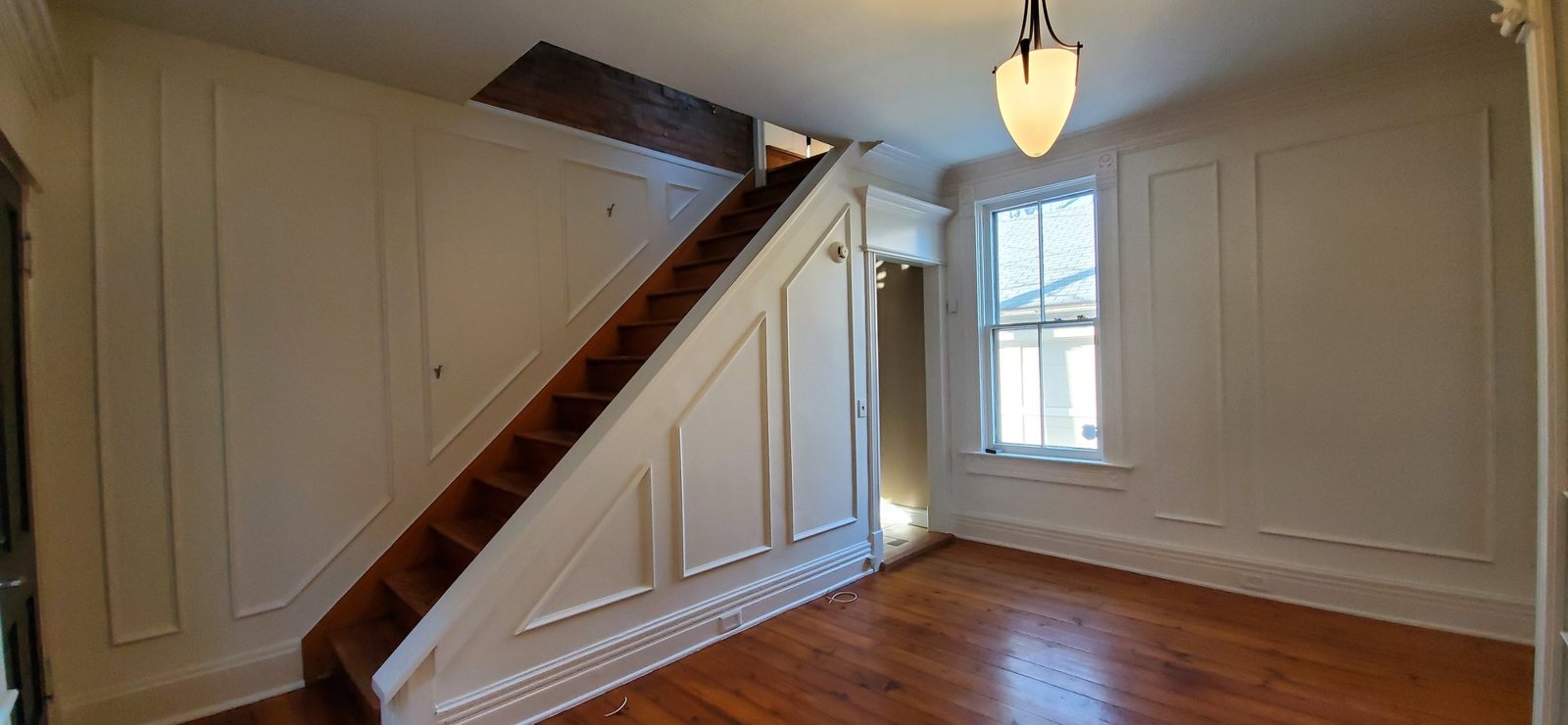 Wainscoting staircase painted white after — Segor Painting, Columbus OH