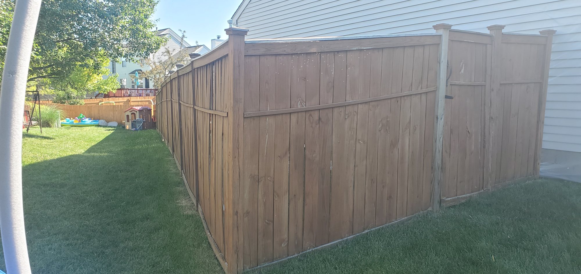 Wood fence stained brown before Wood fence stained brown before — Segor Painting, Columbus OH